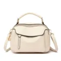 Stylish soft leather women's crossbody bag with top handle and spacious multi-functional design. - Off White