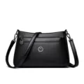 Black leather shoulder bag for women, elegant crossbody bag with multi-zipper compartments. - Black