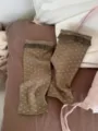 Brown floral stirrup socks with lace ruffle trim, cozy vintage aesthetic ribbed knit socks. - One Size / Sand Brown