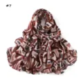 Geometric print detail of the soft cotton long scarf, showing intricate abstract pattern design. - Size 7