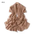Detailed view of lightweight pleated chiffon shawl scarf with shimmering silver thread. - Mousse Brown