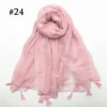 Detail view of the solid pink voile scarf with delicate tassel fringe for women and daily wear. - Pink