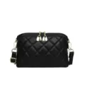 Black quilted leather crossbody bag for women, stylish dome shoulder bag with gold hardware. - Black Argyle