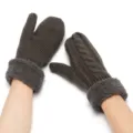 Close up of dark grey knitted mittens with fuzzy cuffs, warm winter hand wear details. - Dark Gray