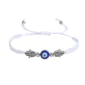 Bracelet tisse blanc reglable avec oeil turc bleu au centre et amulettes main de Fatima argentees. - Main de Fatma Argent (Corde Blanche)