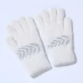Detailed close-up of winter warm knitted five-finger gloves with fuzzy texture and pattern. - One Size / White