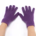 Close-up view of purple rabbit hair knit gloves showing fluffy texture and flexible fingers. - Purple