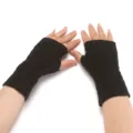 Black knitted fingerless gloves for winter warmth, short half-finger design with diamond pattern. - Black