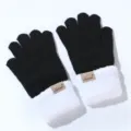 Black and white fleece-lined knitted touchscreen gloves detail view, warm winter gear. - One Size / Black