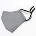 Grey fabric dust mask with adjustable black ear loops and 3D design for daily protection. - One Size / Gray