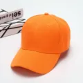 Unisex solid orange baseball cap, casual curved brim sun hat for outdoor sports and daily wear. - Adjustable / Orange