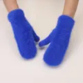 Close-up detail view of the soft royal blue plush winter mittens showing fluffy texture. - One Size / Sapphire Blue
