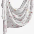Close-up of a white floral printed rayon scarf, showing delicate pink flowers and soft texture. - YW534-01