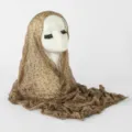 Detailed close-up of the brown polka dot bubble wrinkle hijab scarf, showing fabric texture. - Dark Camel Polka Dot