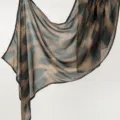 Close-up detail of the soft rayon animal print long scarf, showing fine texture and edges. - YW483-01