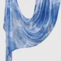 Blue watercolor floral print scarf detail showing soft fabric texture and graceful drape effect. - Blue White Ink Wash