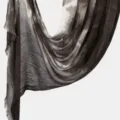 Close-up detail of lightweight crinkled tie-dye scarf showcasing soft texture and fine fringe. - Coffee
