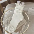 White lace ruffle mid-calf stacking socks for women, breathable cotton cute casual hosiery. - Milky White
