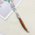 Stainless steel fork with wood grain handle, elegant design for daily dining, kitchen tableware SKU. - Dinner Fork
