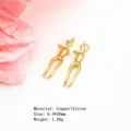 Detail view of the elegant copper hugging human figure pendant, showing delicate polished surface texture. - Double Embrace Pendant Only (Without Chain) (0065) / 1 Piece/Pack (6.5*30mm)
