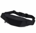 Close-up detail of the black tactical waist bag with MOLLE webbing and durable buckle. - Black