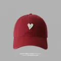 Red baseball cap with cute heart embroidery, casual Korean style soft top dad hat for women and men. - Burgundy