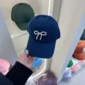 Navy blue baseball cap featuring a delicate pearl bow design, soft crown casual sun hat. - Adjustable / Navy Blue Pearl Bow Baseball Cap