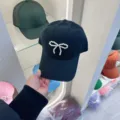 Black baseball cap featuring an elegant pearl bow design, casual sun protection hat. - Adjustable / Black Pearl Bow Baseball Cap