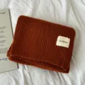 Thickened knitted winter scarf in warm caramel brown color, cozy solid design for cold weather. - Caramel color