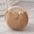 Sac à main rond en paille tissée avec poignées et fermoir en cuir, sac de plage chic. - 25cmx25cmx18cm / Brun
