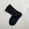 Calcetines de tubo medio retro con flores para mujer otoño invierno algodón variante negra - Talla única / Negro