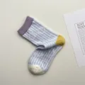 Chaussettes mi-mollet en coton rayées color-block douillettes avec motifs mignons pour femme. - Taille unique / Poire