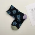 Women vintage mid-calf cotton socks black with blue relief floral pattern and colorful heel toe - Night Sky Fireworks