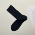 Calcetines negros acanalados de media pantorrilla, suaves y cómodos para el uso diario. - Talla única / Negro