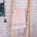 Pink cotton face towel with grey stripes hanging on wooden ladder lifestyle product variant - Pink / 35*75cm
