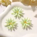 Close up of mint green daisy beaded charms, delicate DIY jewelry making accessory details. - Style 39 / 1 Piece/Pack