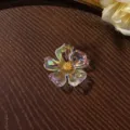 Clear iridescent acrylic flower detail shot, golden pistil, perfect for DIY jewelry crafting. - Size 6 / 1 Piece