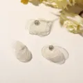 Detailed shot of sheer mesh flower DIY accessories with sparkling crystal center for crafts. - One Piece / Apricot
