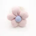 Gros plan de rond de serviette en tissu fait main, pétales roses avec cœur bleu, déco. - Rose