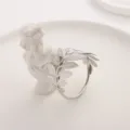 Silver metal leaf napkin ring for elegant dining table decor and home kitchen settings. - Silver