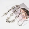 Catena da vita in metallo argentato con anelli geometrici per accessori moda donna. - 133cm / Argento