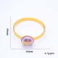 Rond de serviette en métal doré avec pierre irisée colorée pour une belle décoration. - Or (Design Ondulé Ajouré)