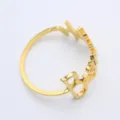 Bague de serviette en metal de luxe avec design de lettres pour decoration de table. - Or