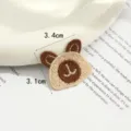 Close-up of a cute bear embroidery patch, detailed woven accessory for DIY crafts. - Brown Bear Embroidered Style (款式1)