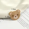 Close-up detail of a cute brown bear embroidery cloth patch, perfect for DIY crafts and accessories. - Close-up Brown Bear Style (款式2)