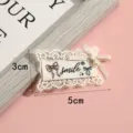 Schattige kanten geborduurde patch met strik en parel voor DIY kleding en accessoires decoreren. - #2 (Glimlach Strik)
