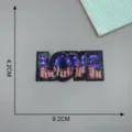 Sequin LOVE letter patch with US flag design, ideal for clothes decoration and DIY repair. - LOVE