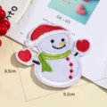 Close-up detail of a cute Christmas snowman embroidered patch featuring a red Santa hat and scarf. - Style 8 (9.2x8.5cm)