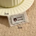 Handmade fabric patch with cute bear embroidery and lace border, 3x5cm DIY accessory. - Style #6