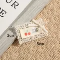 Handgemachte Spitzenstickerei Patch mit Schleife Perle Kirsche DIY Kleidung Zubehör 3x5cm groß - US Größe 8
